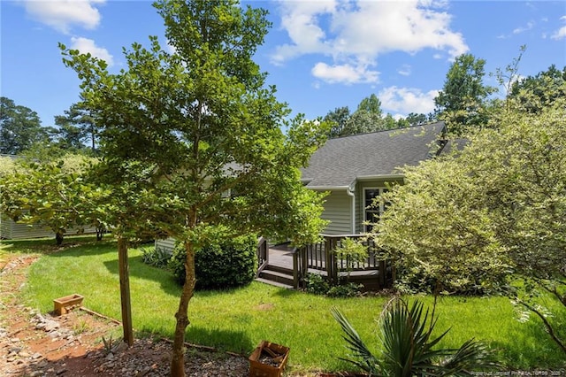 view of yard featuring a deck