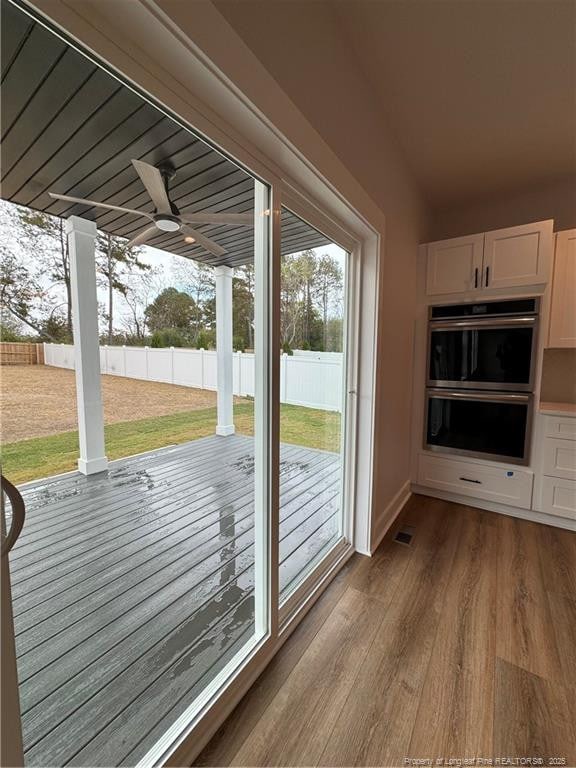 doorway to outside featuring visible vents and light wood-style flooring