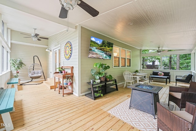 deck featuring french doors and an outdoor living space with a fire pit