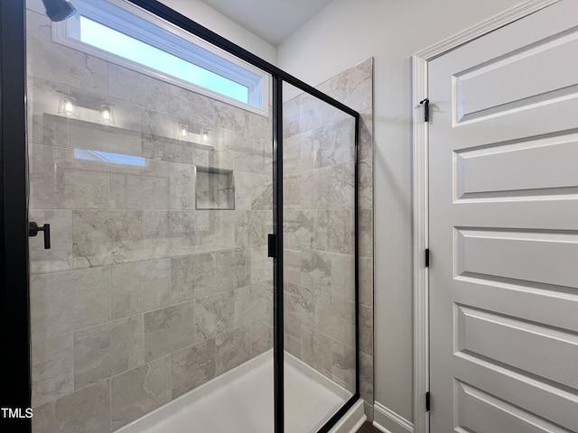 bathroom with an enclosed shower