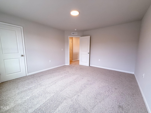 empty room with carpet floors