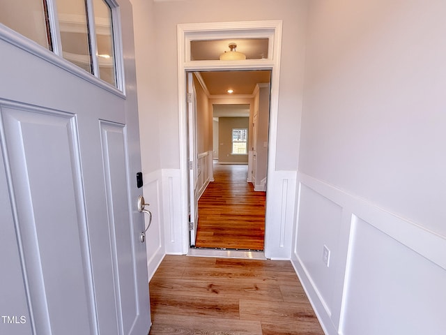 doorway to outside with light hardwood / wood-style flooring