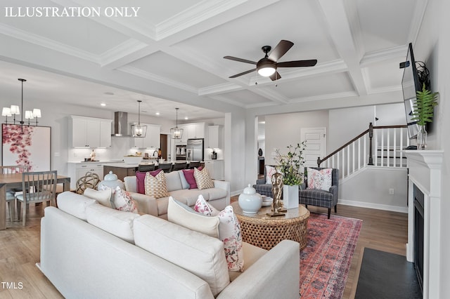 living room with light wood-type flooring, beam ceiling, ceiling fan with notable chandelier, ornamental molding, and coffered ceiling