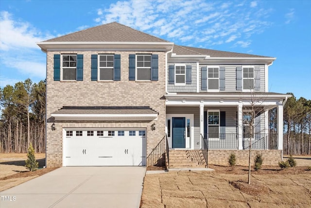 view of front of property featuring a garage