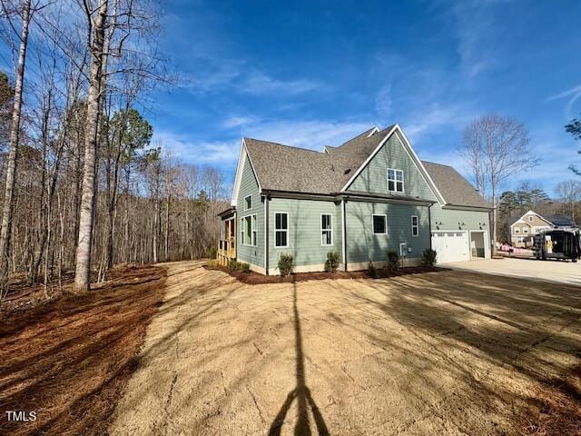 exterior space with a garage