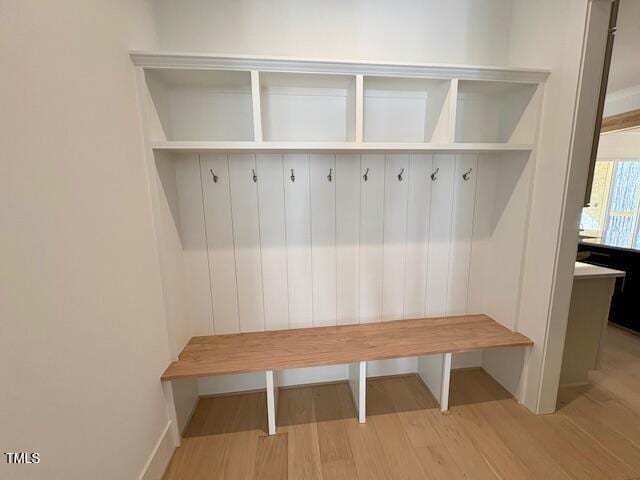 mudroom with light hardwood / wood-style flooring