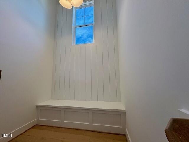 mudroom with light hardwood / wood-style flooring