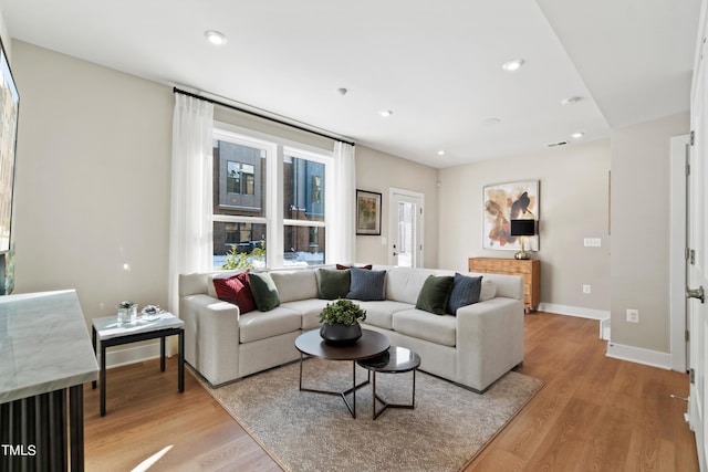 living room featuring light hardwood / wood-style floors