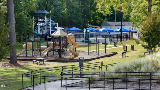 view of playground featuring a lawn