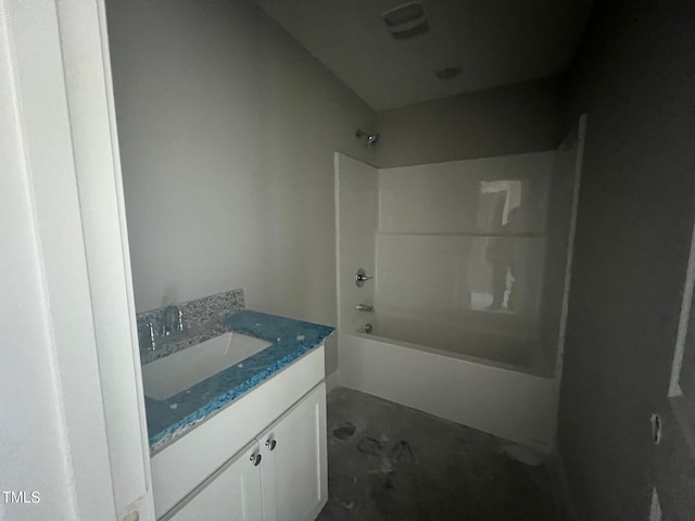 bathroom featuring shower / tub combination, vanity, and concrete floors