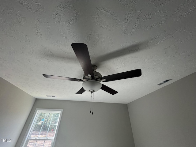 interior details with a textured ceiling