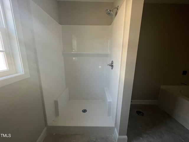 bathroom featuring walk in shower