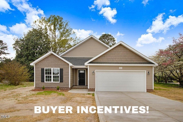 3104 Summit Rd, Goldsboro, NC 27534 - view of front of home featuring an attached garage, driveway, and a shingled roof