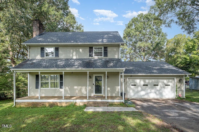 view of front of home featuring a front lawn and a porch