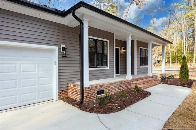 doorway to property with a porch