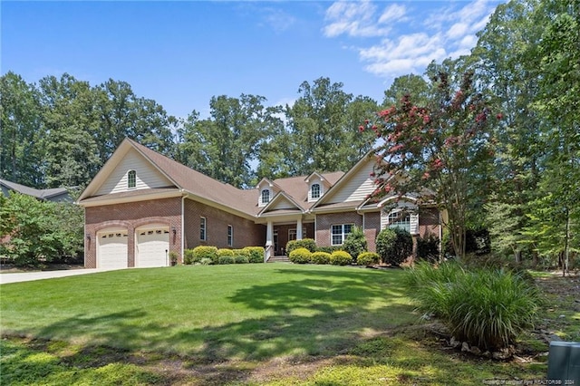 view of front of house with a garage, brick siding, concrete driveway, and a front lawn