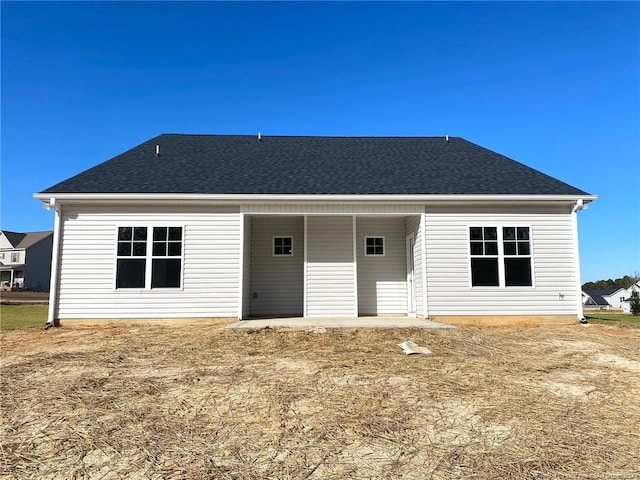 back of property featuring a patio