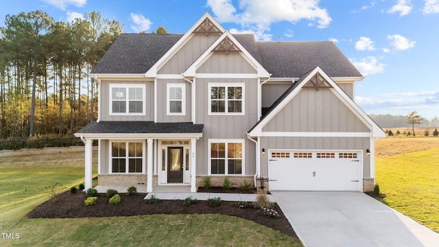 craftsman-style home with a front lawn and a garage