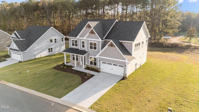 view of front facade with a garage and a front lawn