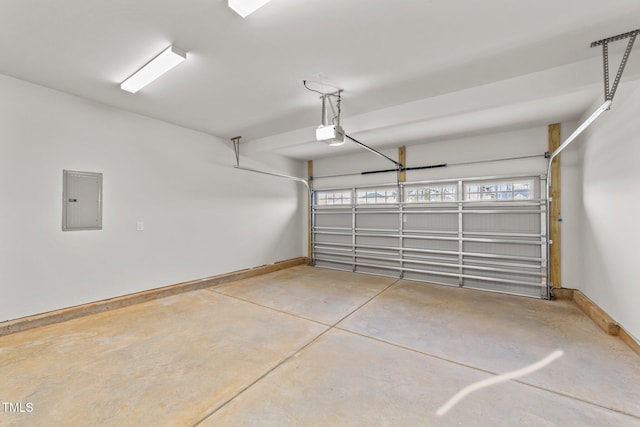 garage with electric panel and a garage door opener