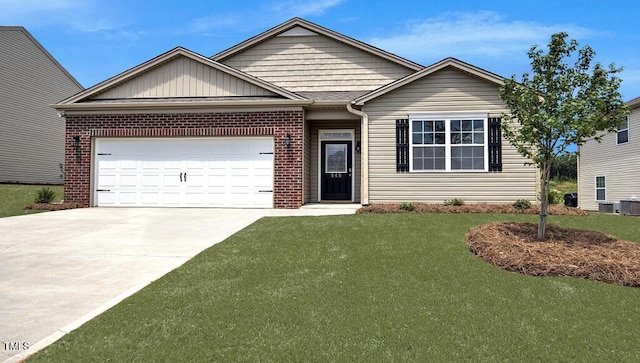 view of front facade with a garage and a front lawn