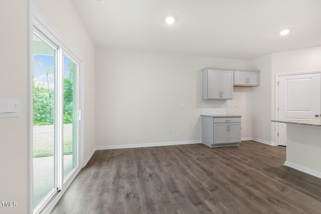 interior space with dark hardwood / wood-style flooring