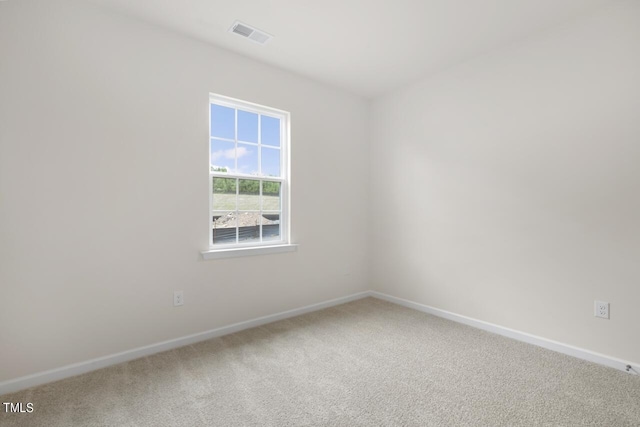 unfurnished room with carpet flooring