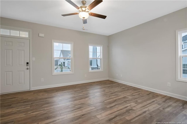 foyer entrance featuring hardwood / wood-style floors and ceiling fan