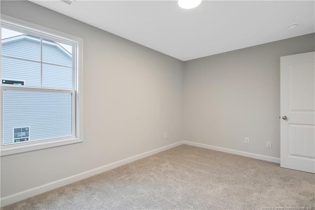 view of carpeted spare room