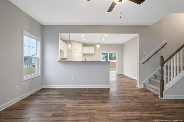  - kitchen featuring white cabinets, ceiling fan, dark wood-style floors, recessed lighting, and pendant lighting