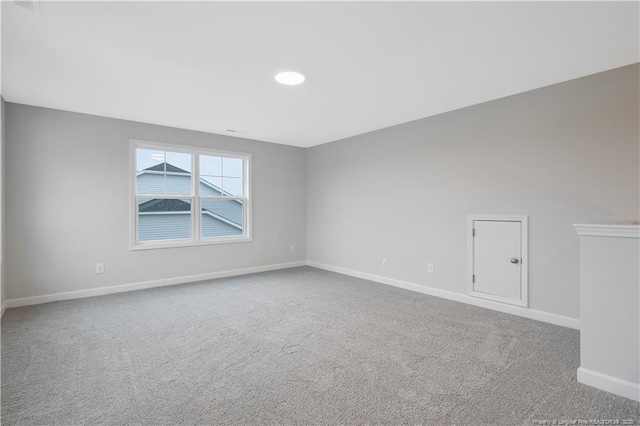  - carpeted spare room with baseboards and recessed lighting