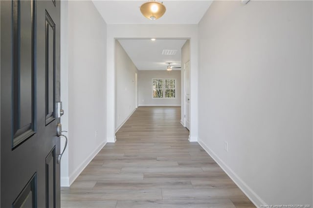5513 Tall Timbers Dr, Fayetteville, NC 28311 - hall with light wood-type flooring and baseboards