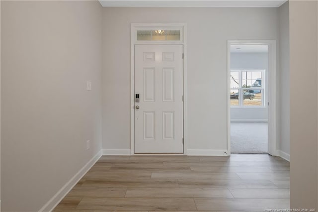 5513 Tall Timbers Dr, Fayetteville, NC 28311 - foyer entrance with light wood-style flooring and baseboards