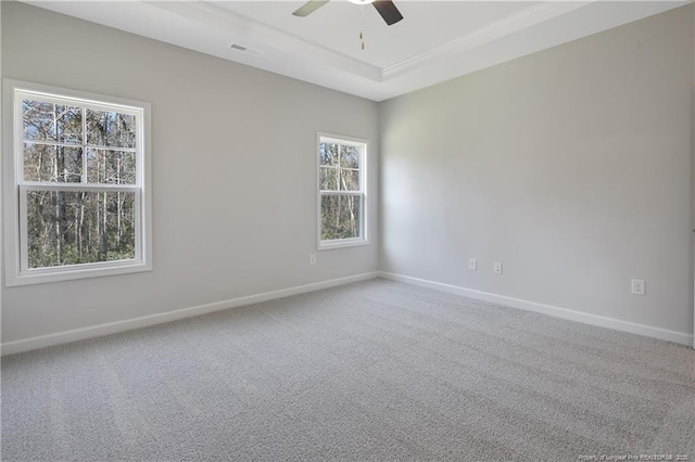 5513 Tall Timbers Dr, Fayetteville, NC 28311 - carpeted empty room with ceiling fan, baseboards, and a raised ceiling
