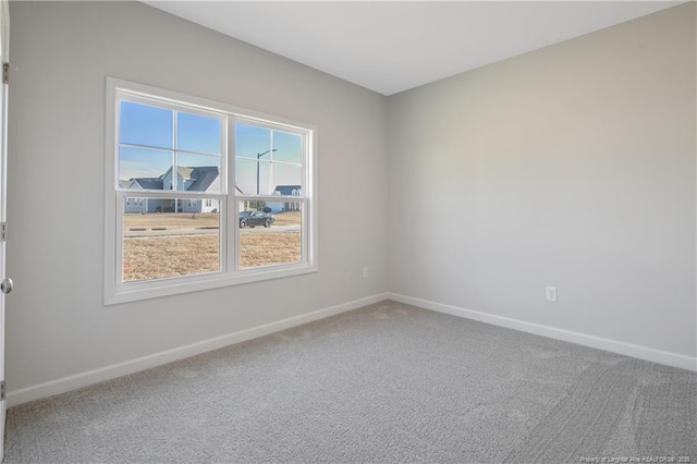 5513 Tall Timbers Dr, Fayetteville, NC 28311 - carpeted spare room with baseboards