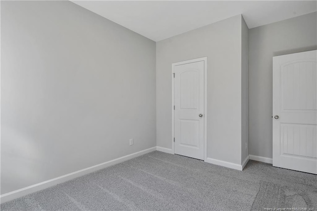5513 Tall Timbers Dr, Fayetteville, NC 28311 - unfurnished bedroom featuring carpet floors and baseboards