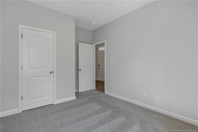 5513 Tall Timbers Dr, Fayetteville, NC 28311 - unfurnished bedroom with carpet and baseboards