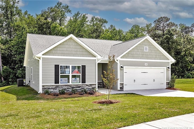 5513 Tall Timbers Dr, Fayetteville, NC 28311 - craftsman-style home with an attached garage, concrete driveway, a front lawn, cooling unit, and stone siding