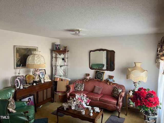 carpeted living room featuring a textured ceiling