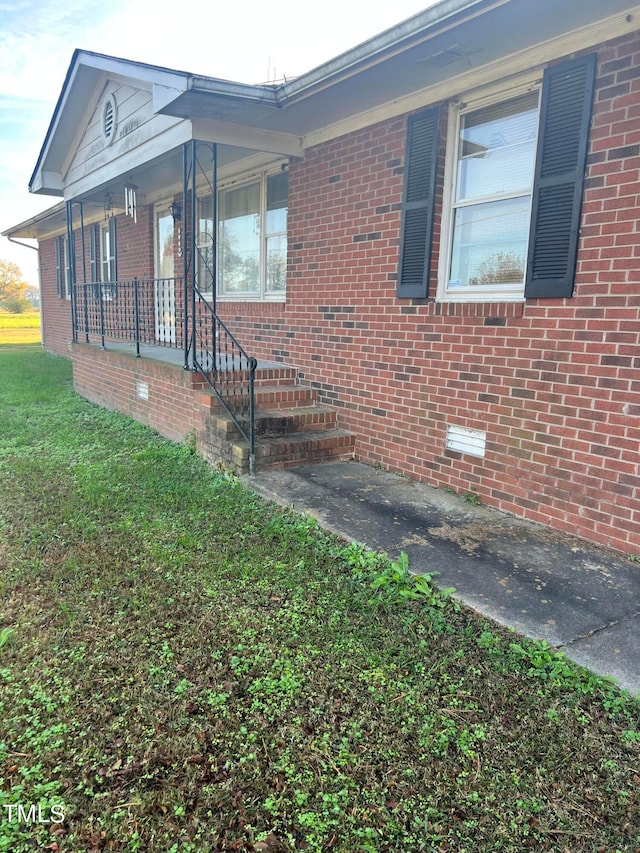 view of home's exterior featuring a porch