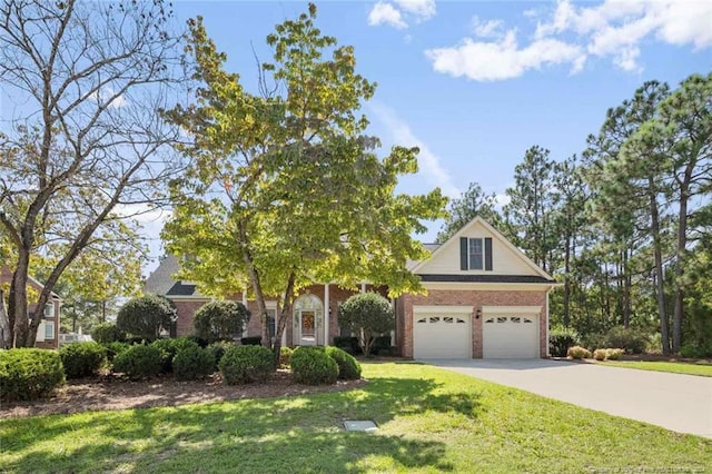 view of front facade featuring a garage and a front lawn