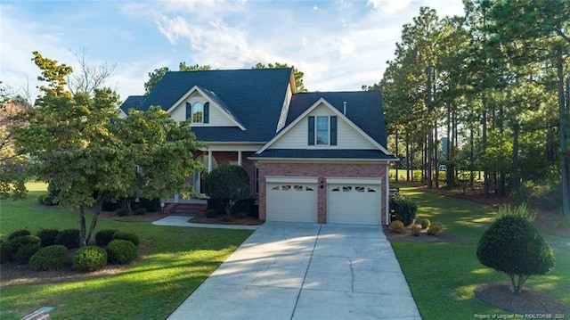 craftsman-style house with a garage and a front lawn