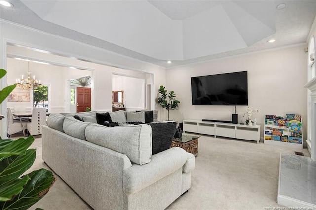 living room with a chandelier, carpet, and ornamental molding