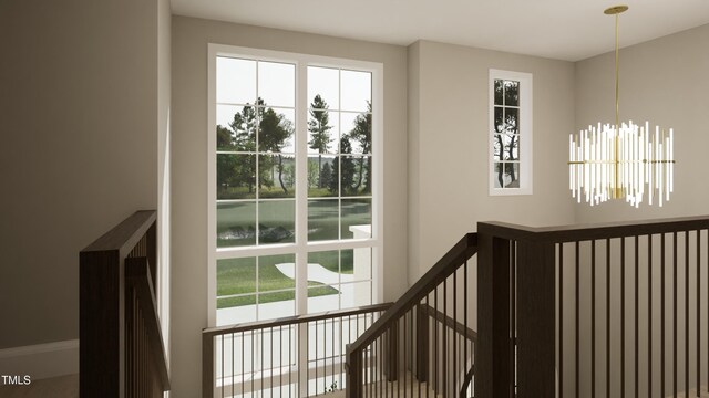 doorway featuring an inviting chandelier