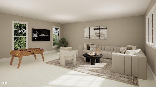 living area featuring baseboards and carpet flooring
