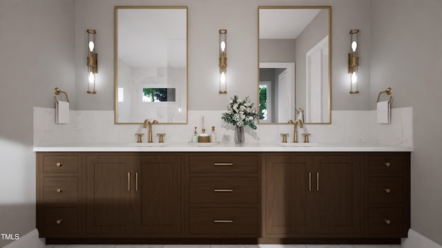 full bath featuring a sink, decorative backsplash, and double vanity