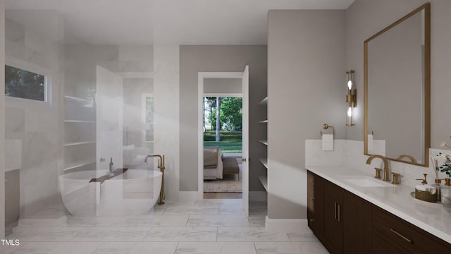 full bathroom featuring a soaking tub, vanity, ensuite bath, marble finish floor, and baseboards