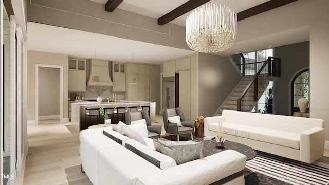living room featuring a chandelier, stairs, light wood-style floors, and beam ceiling