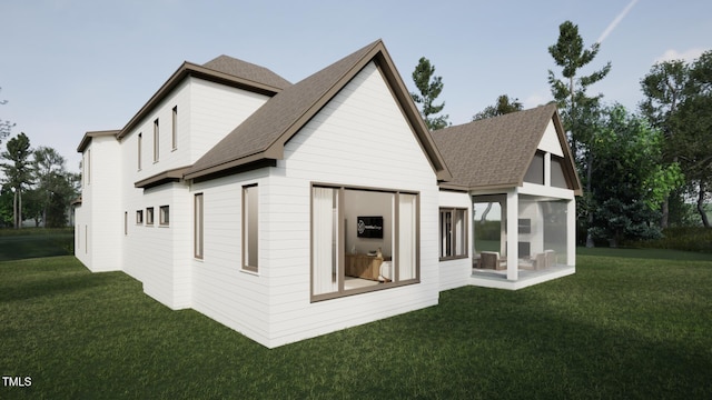 back of house with roof with shingles, a sunroom, and a lawn
