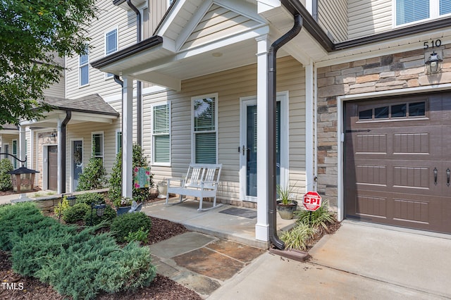 property entrance with a garage